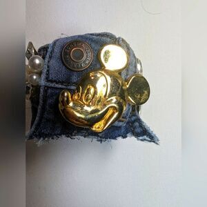 Wendy Gell denim wristy,gold Mickey Mouse profile Swarovski jewels in Crystal.